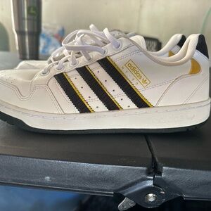 Adidas Men's White Sneakers with Black and Yellow Accents